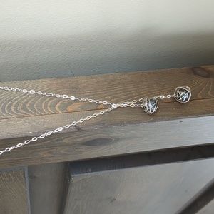 Black pearl and silver necklace